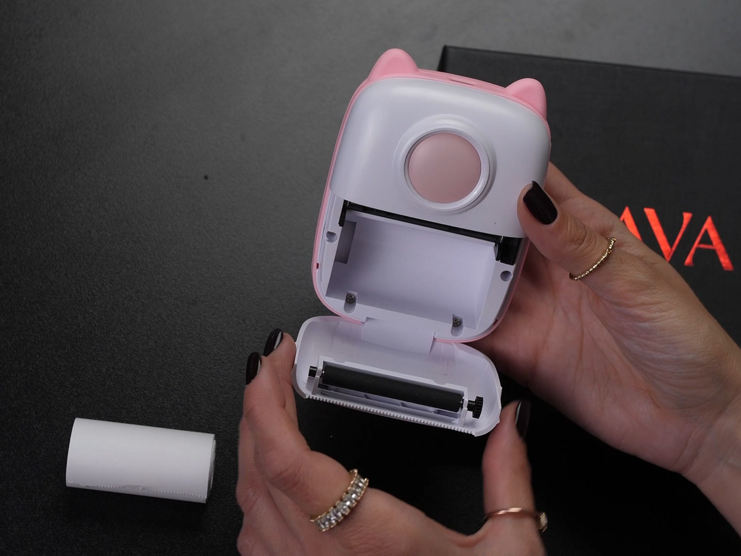 Kako se stavlja termo rolna u Mini Printer